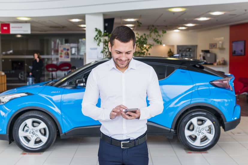 Editors%2 Fimages%2 F1768279436527 Portrait Salesman Car Dealership+%281%29