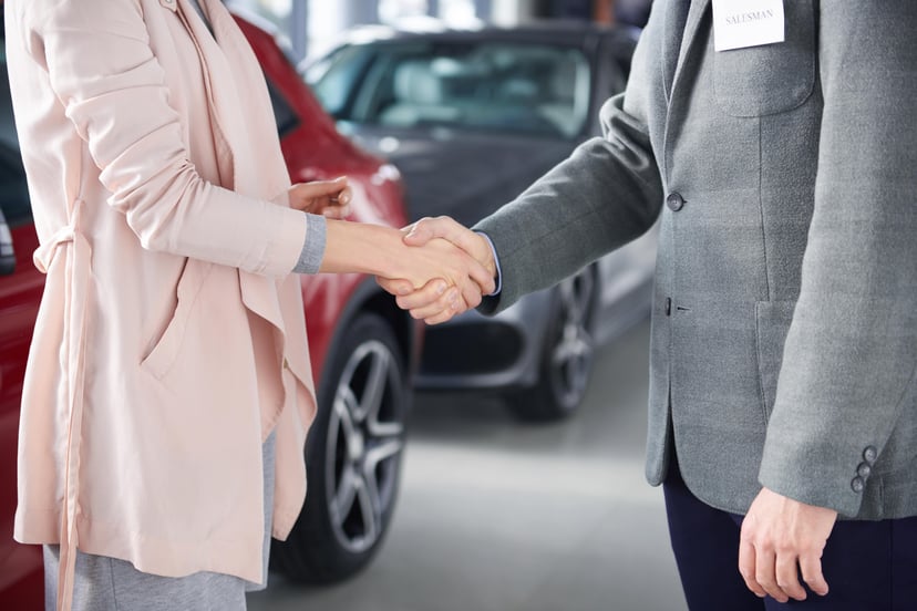 Close Up Handshake Salesman Woman Min